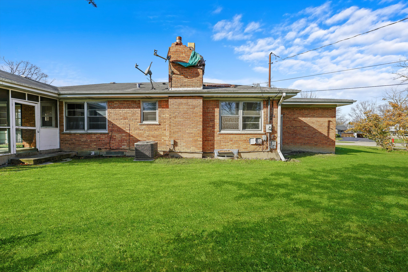 1725 North Happ Road Northbrook, IL 60062 - Photo 30 of 33 a front view of house with yard and outdoor seating