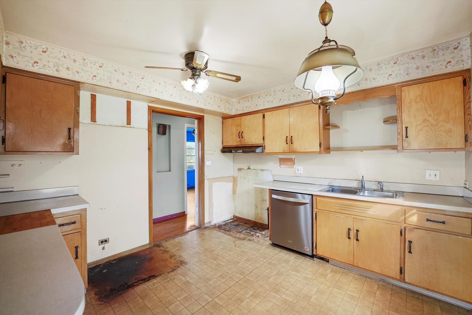 1725 North Happ Road Northbrook, IL 60062 - Photo 10 of 33 a kitchen with stainless steel appliances granite countertop a sink a stove and refrigerator