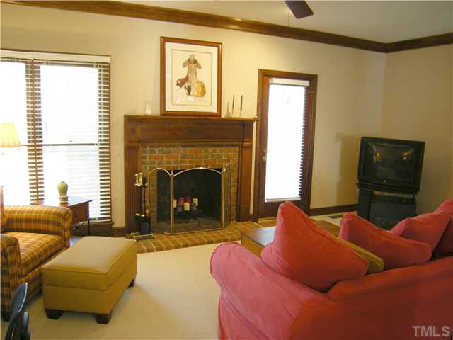 135 Skylark Way Raleigh, NC 27615 - Photo 3 of 14 2B/2Bath home with spacious living room with masonry wood burning FP , newer carpet and fresh neutral paint is a great gathering spot