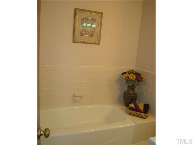 135 Skylark Way Raleigh, NC 27615 - Photo 9 of 14 Master bath offers a separate tub and shower