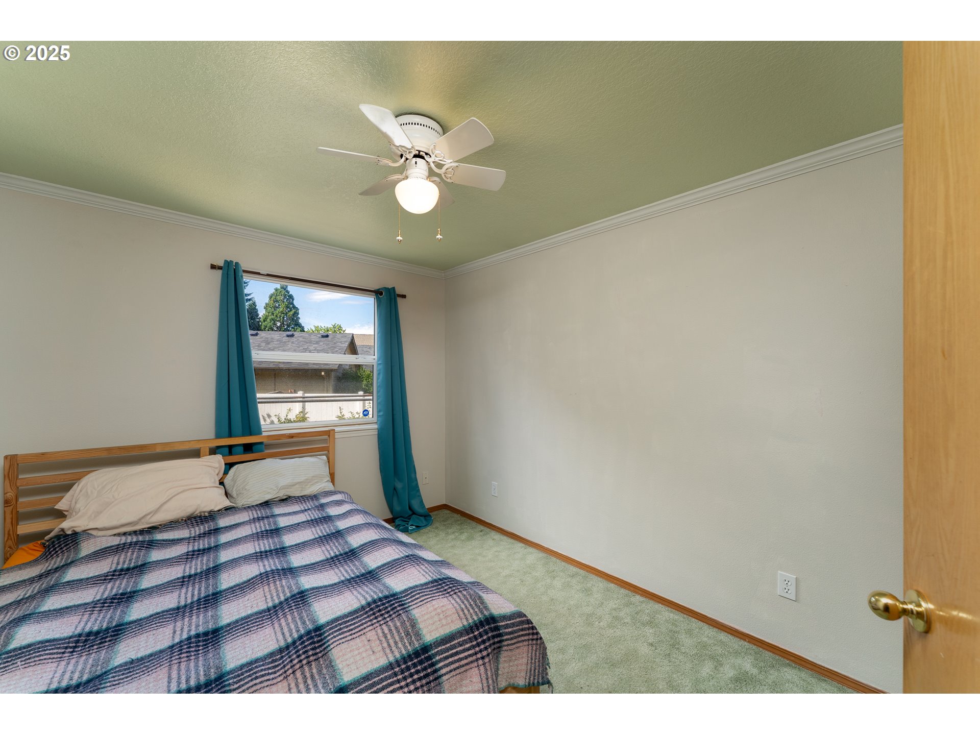 1108 Hadley Road Newberg, OR 97132 - Photo 24 of 42 a bedroom with a bed and a dresser