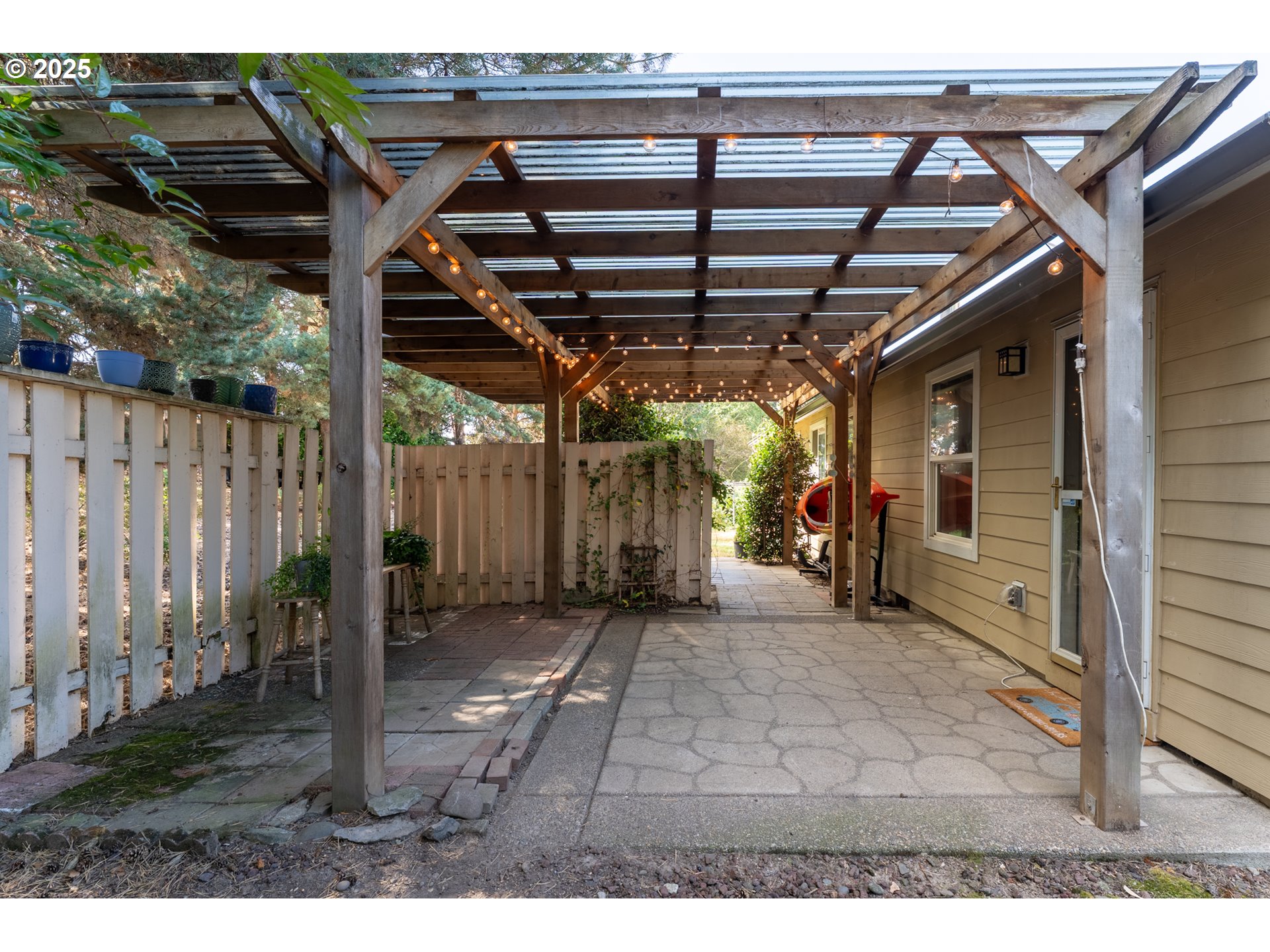 1108 Hadley Road Newberg, OR 97132 - Photo 26 of 42 a view of an empty room with wooden floor
