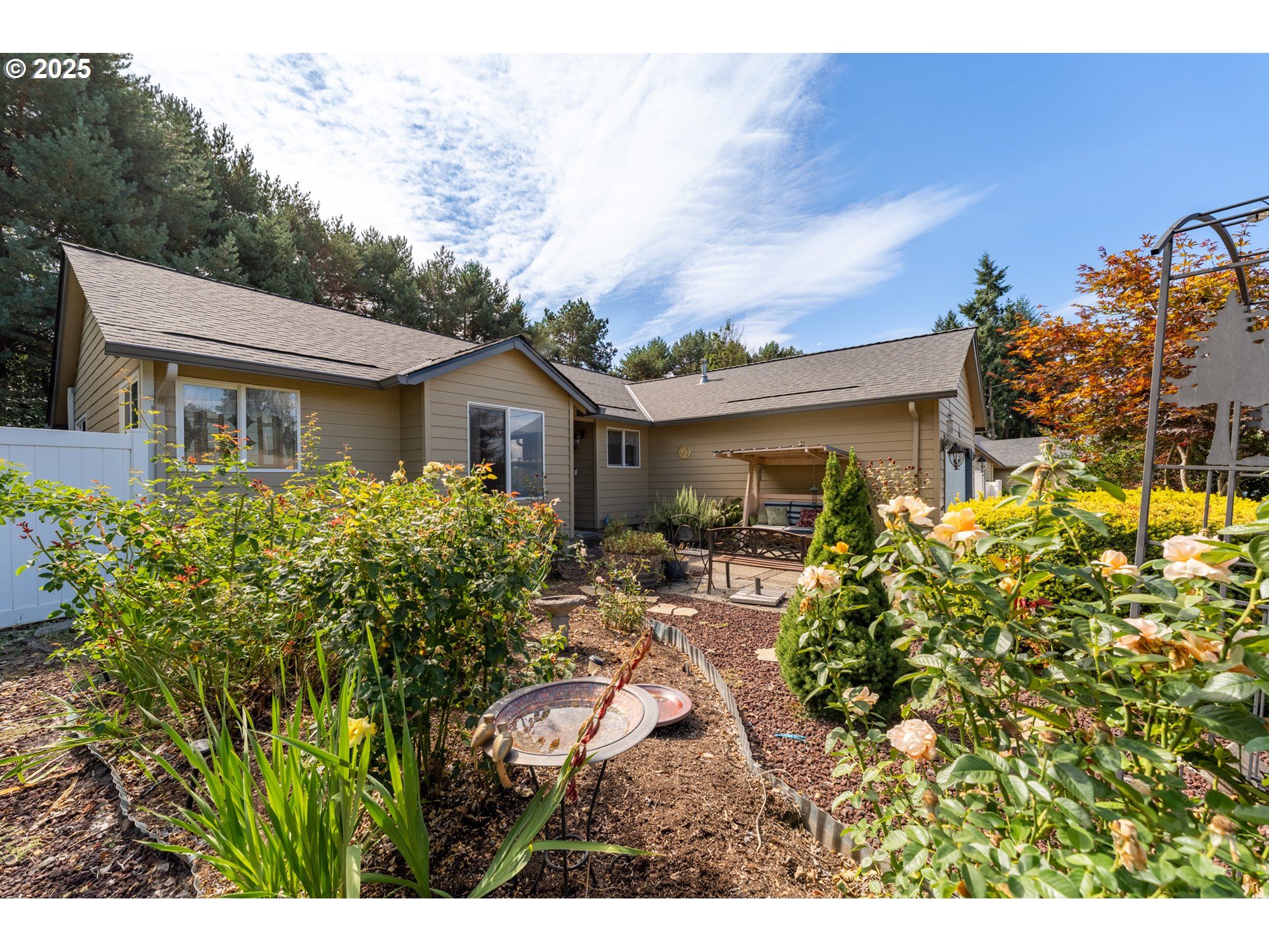 1108 Hadley Road Newberg, OR 97132 - Photo 8 of 42 a house view with a garden space