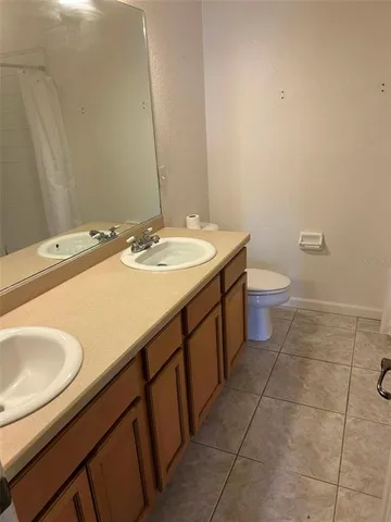 a bathroom with a sink and a toilet