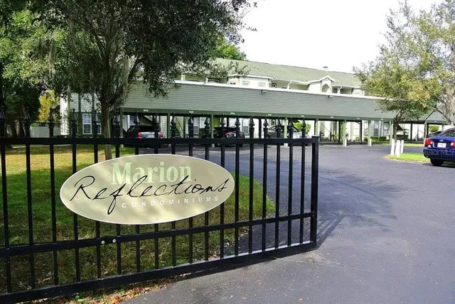 a view of a town with large trees
