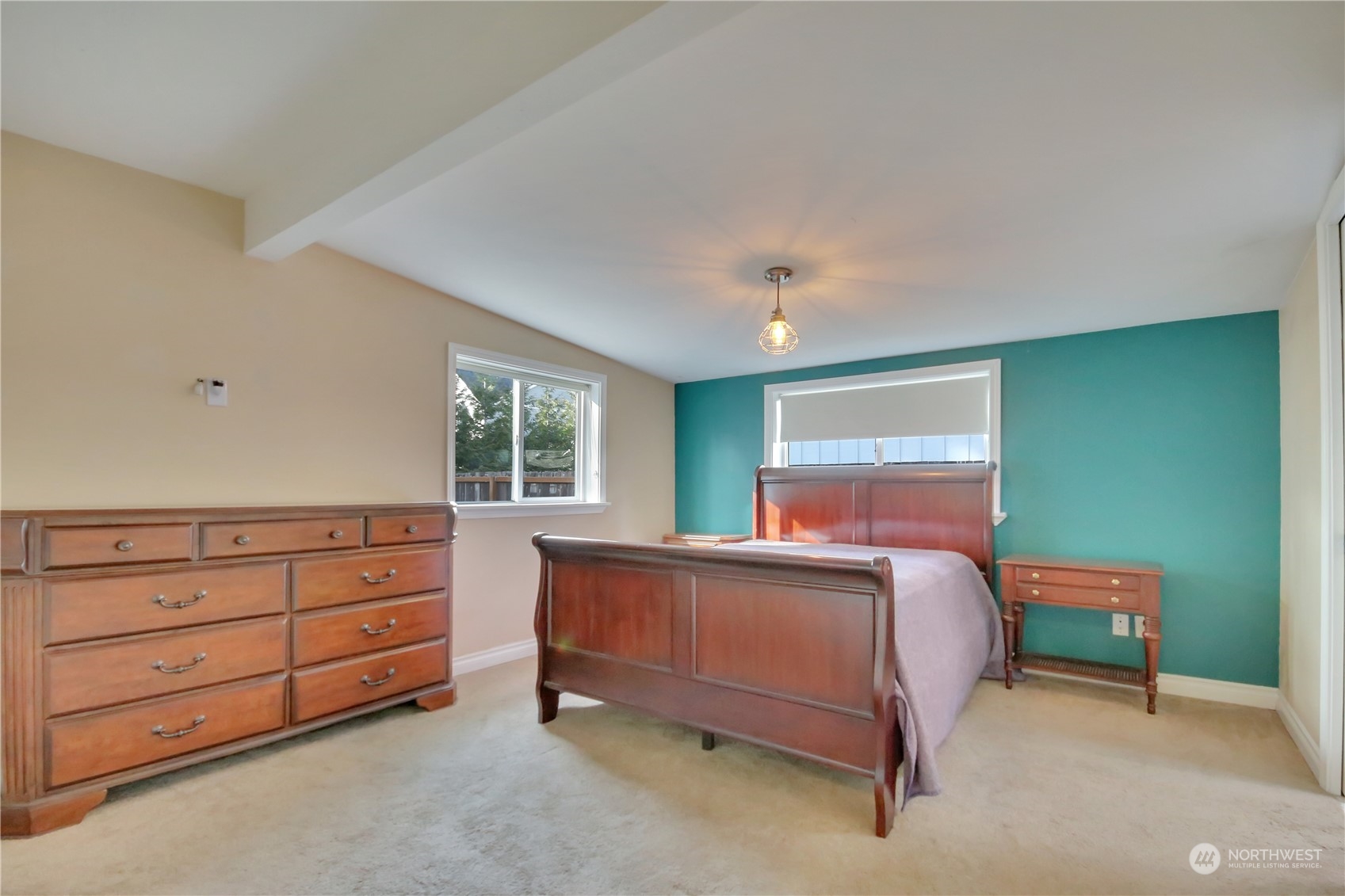 5210 Parker Road East Sumner, WA 98390 - Photo 11 of 25 a bedroom with a bed and a dresser