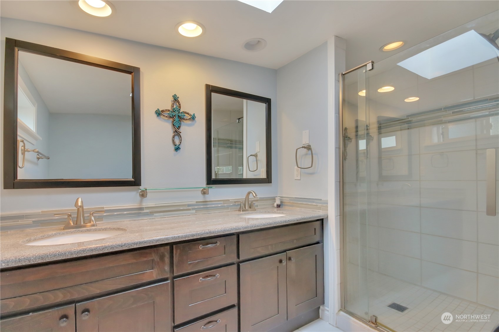 5210 Parker Road East Sumner, WA 98390 - Photo 12 of 25 a bathroom with a double vanity sink mirror and shower