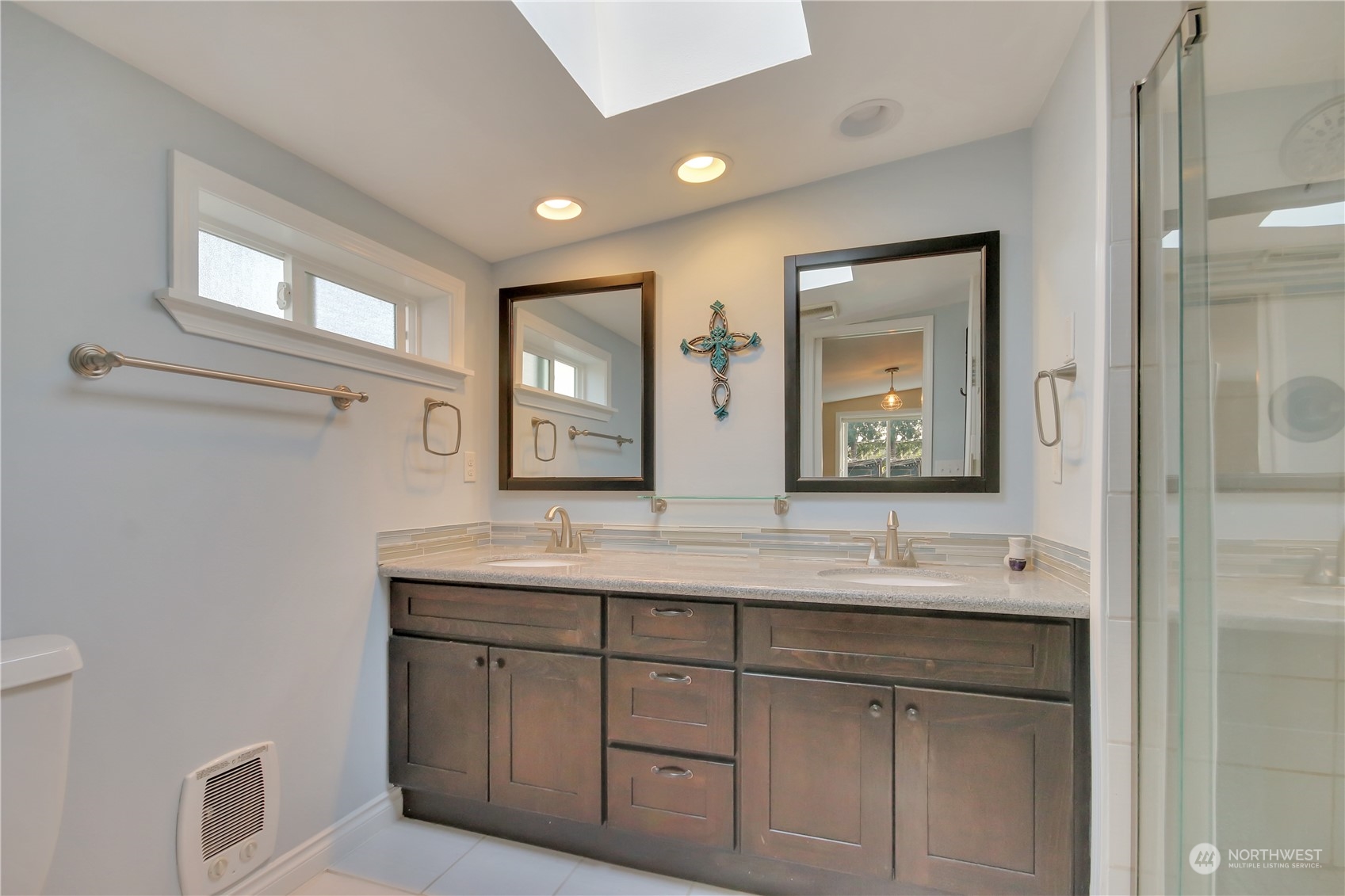 5210 Parker Road East Sumner, WA 98390 - Photo 13 of 25 a bathroom with a double vanity sink and a mirror