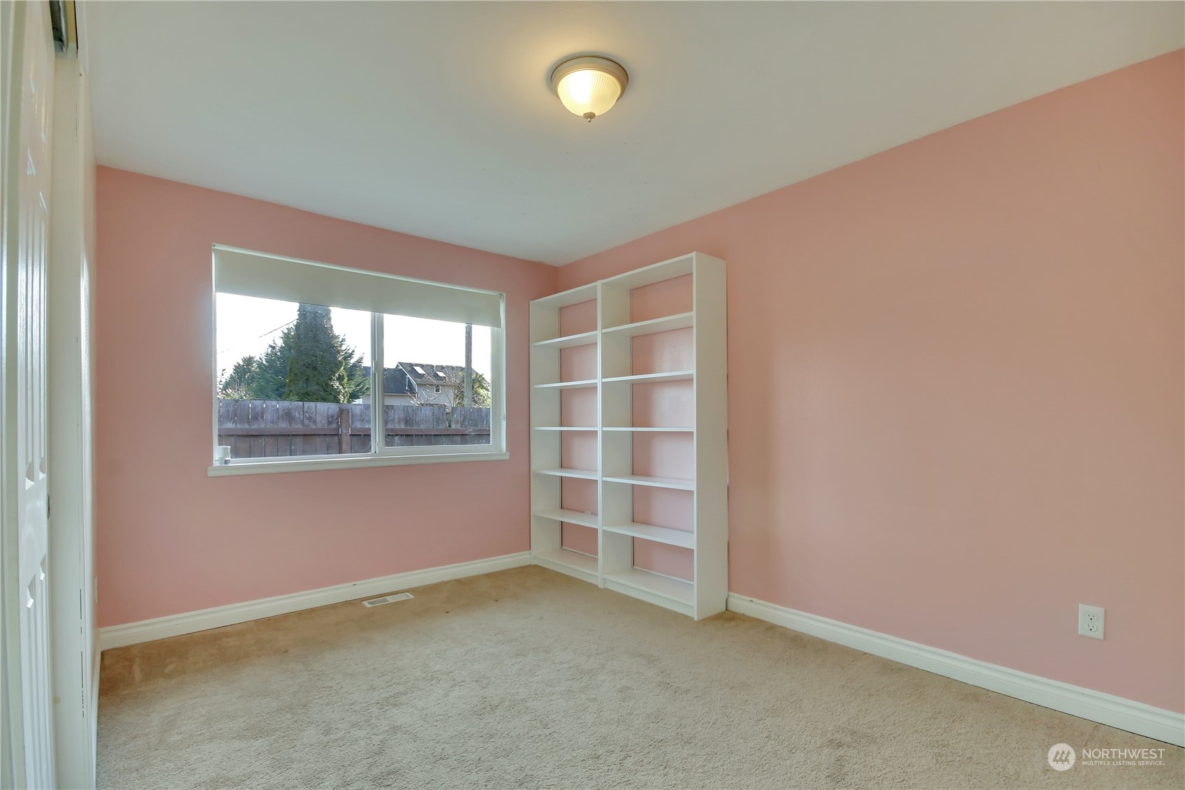 5210 Parker Road East Sumner, WA 98390 - Photo 14 of 25 an empty room with a empty space and windows