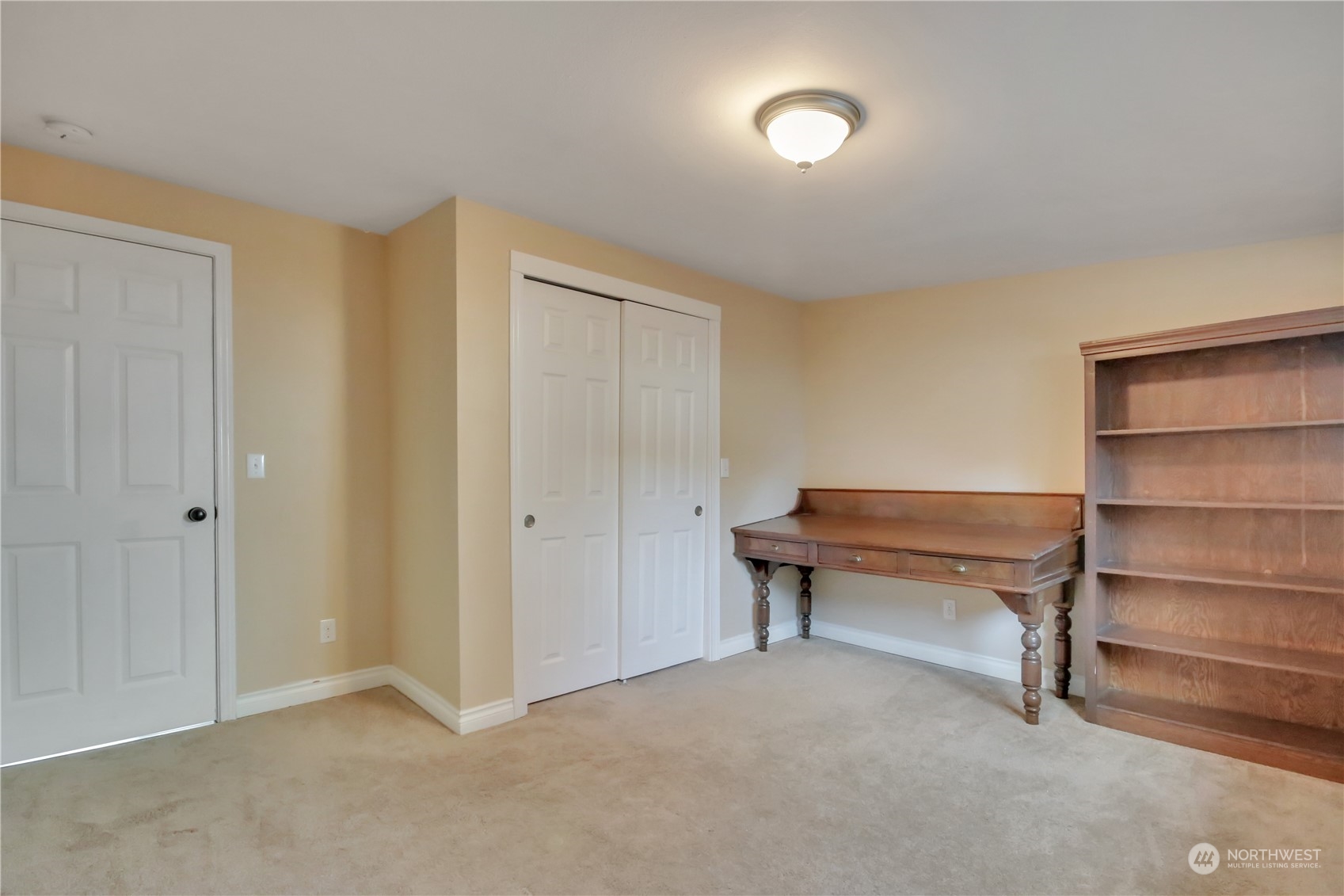 5210 Parker Road East Sumner, WA 98390 - Photo 16 of 25 a view of room with cabinets and a potted plant