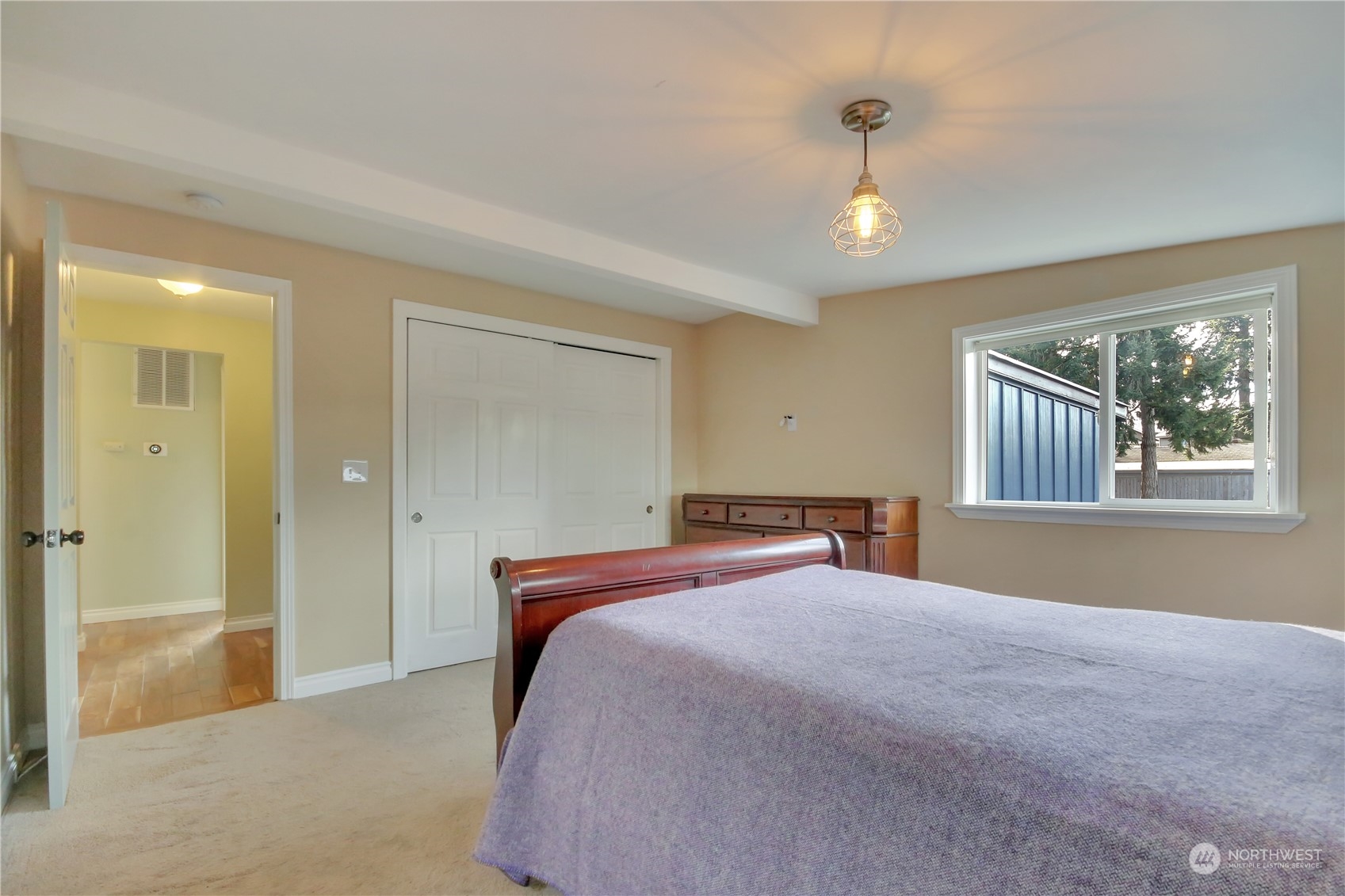 5210 Parker Road East Sumner, WA 98390 - Photo 17 of 25 a bedroom with a bed and a window