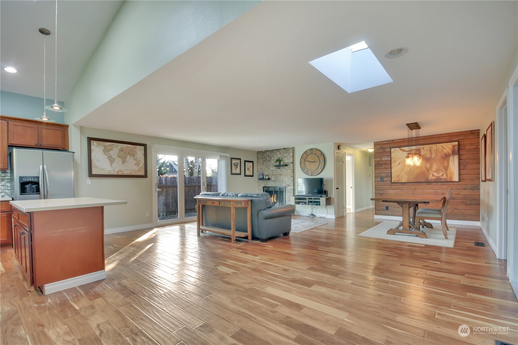 5210 Parker Road East Sumner, WA 98390 - Photo 3 of 25 a living room with furniture and a wooden floor