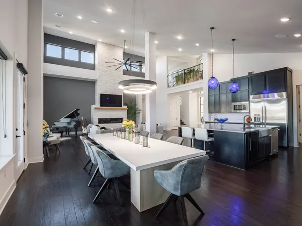 a view of a dining area with furniture and wooden floor