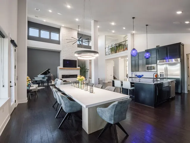 a view of a dining area with furniture and wooden floor