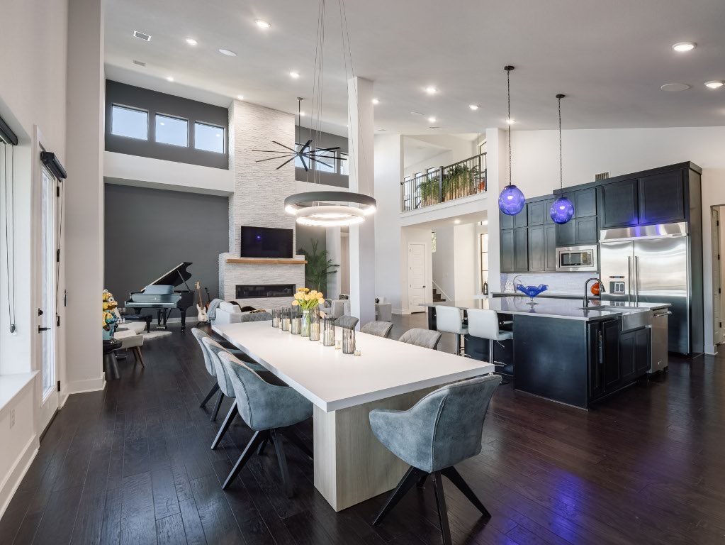 14900 Copper Ridge Lane Austin, TX 78734 - Photo 11 of 39 a view of a dining area with furniture and wooden floor