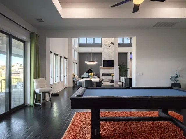a living room with furniture and a table