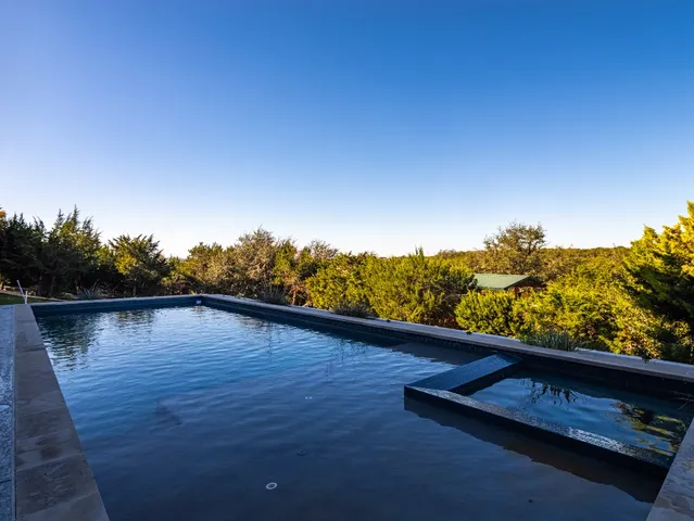 a view of deck and lake with lake view