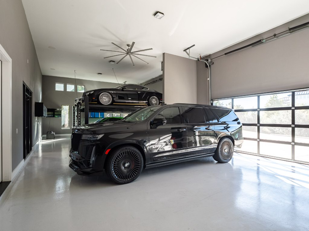 14900 Copper Ridge Lane Austin, TX 78734 - Photo 32 of 39 a car parked in a garage