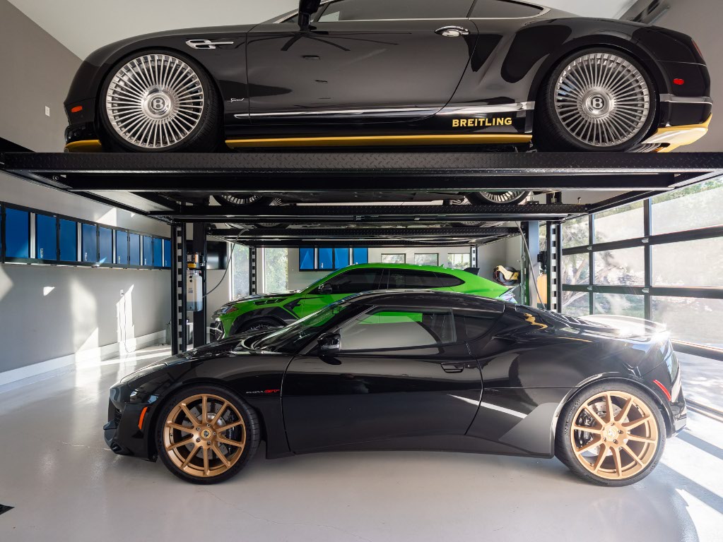 14900 Copper Ridge Lane Austin, TX 78734 - Photo 33 of 39 a car and bike parked in a garage