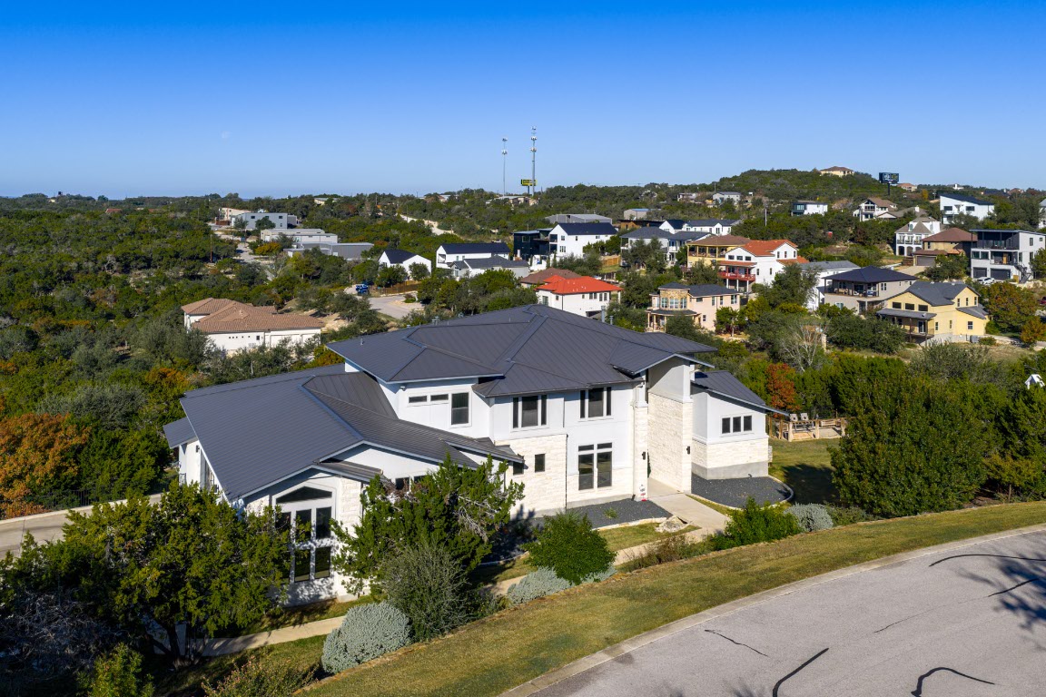 14900 Copper Ridge Lane Austin, TX 78734 - Photo 35 of 39 an aerial view of residential houses with city view
