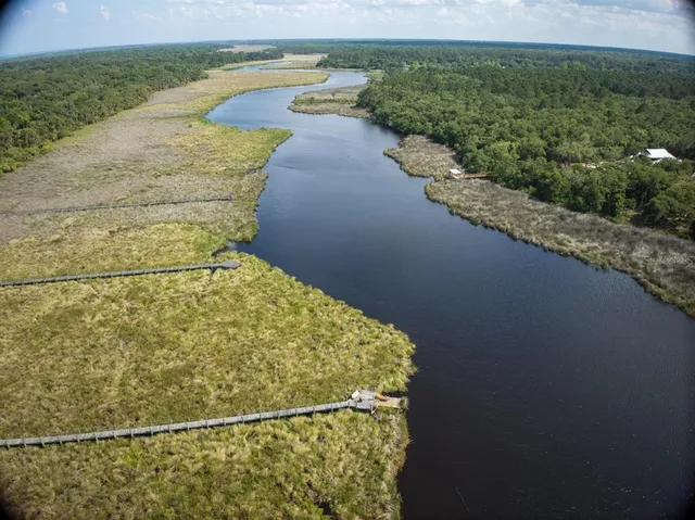 a view of a swimming pool and an outdoor space