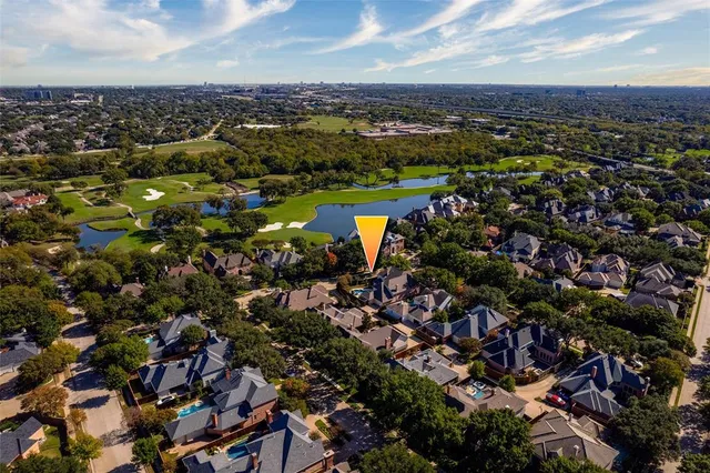 an aerial view of a city with lots of residential buildings