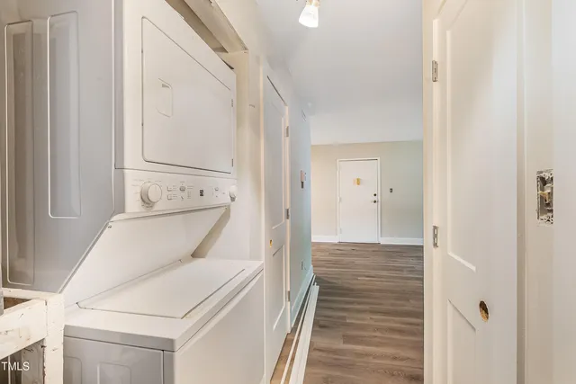 a view of bathroom with washer and dryer