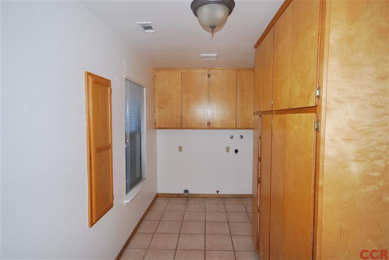 724 Ashland Lane Nipomo, CA 93444 - Photo 3 of 11 a view of kitchen with a refrigerator
