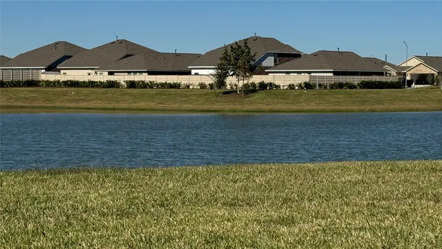 a view of a lake with houses