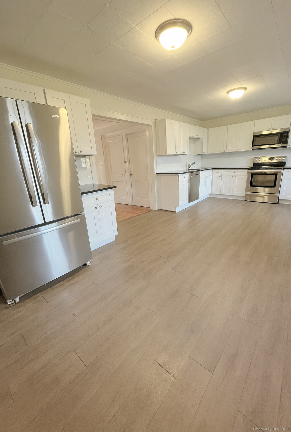 1281 Durham Road Madison, CT 06443 - Photo 13 of 24 a view of a kitchen with a sink