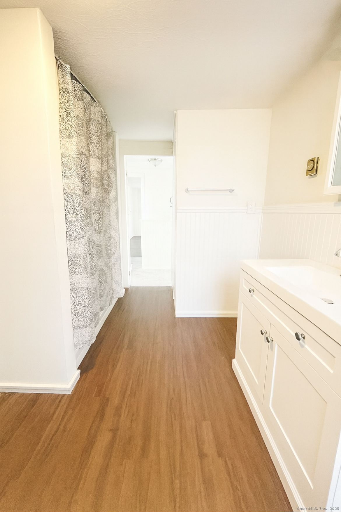 1281 Durham Road Madison, CT 06443 - Photo 22 of 24 a view of a kitchen with wooden floor