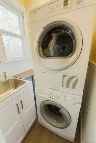 a utility room with dryer and washer