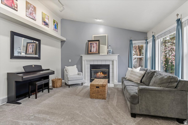 7975 Showcase Lane Sandy, UT 84094 - Photo 3 of 29 Bright open living room with fireplace