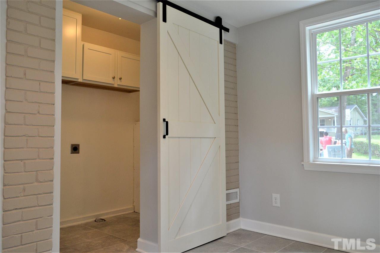 2387 Stevens Road Raleigh, NC 27610 - Photo 11 of 25 a view of an empty room with a window