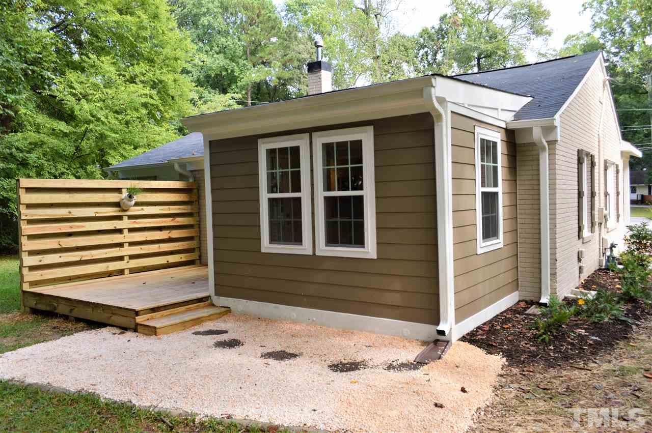 2387 Stevens Road Raleigh, NC 27610 - Photo 20 of 25 a front view of a house with a yard