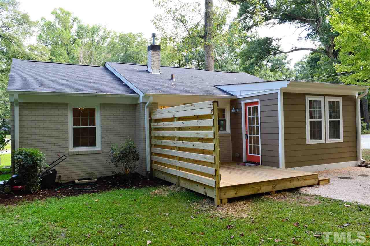 2387 Stevens Road Raleigh, NC 27610 - Photo 21 of 25 a front view of a house with a garden