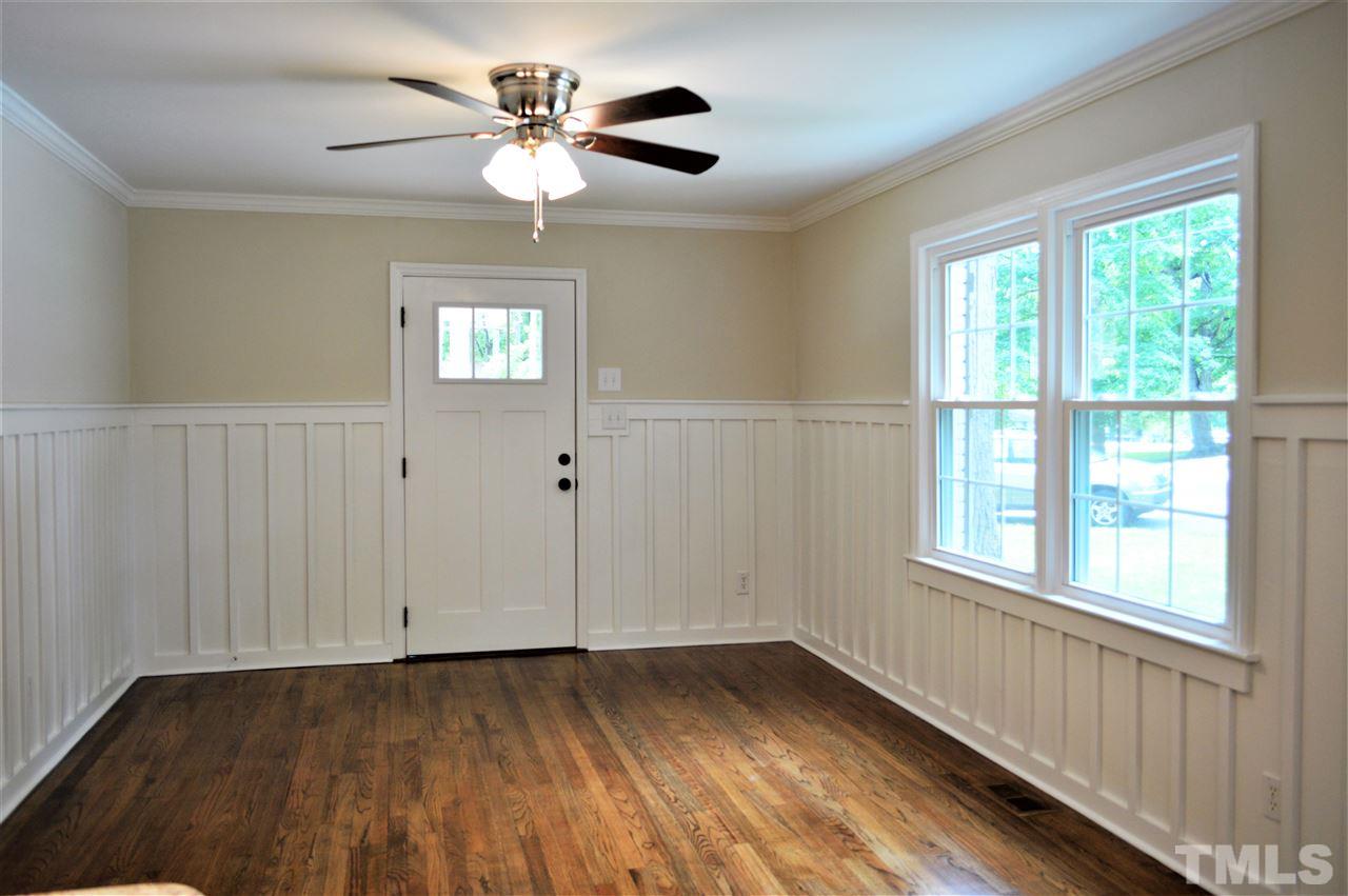 2387 Stevens Road Raleigh, NC 27610 - Photo 8 of 25 a view of an empty room with a window