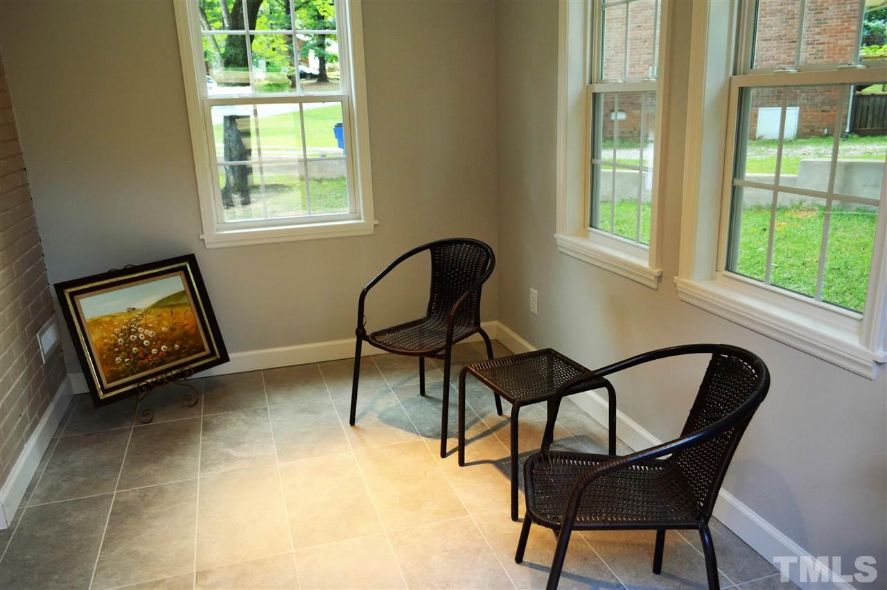 2387 Stevens Road Raleigh, NC 27610 - Photo 10 of 25 a view of a workspace with furniture and a window