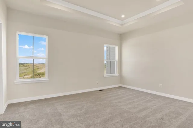 an empty room with closet area