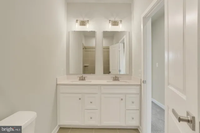 a bathroom with a shower and a toilet