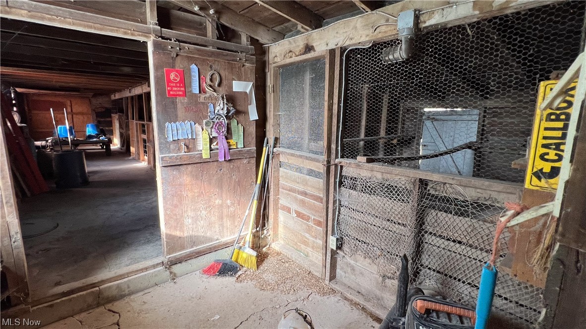 1148 Ridge Road Hinckley, OH 44233 - Photo 30 of 33 1st stall located adjacent to stairs up to stables from garage area