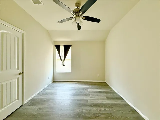 a large kitchen with stainless steel appliances