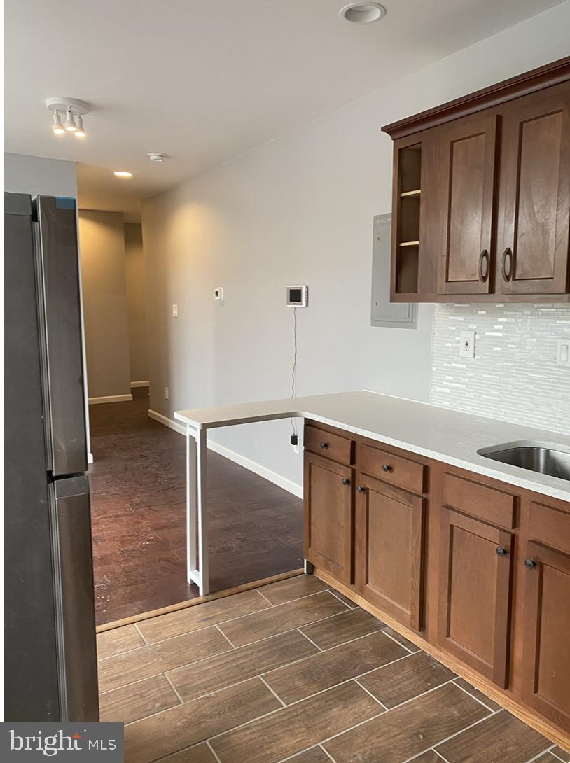 838 Corinthian Avenue, Unit 3 Philadelphia, PA 19130 - Photo 8 of 17 kitchen facing family room