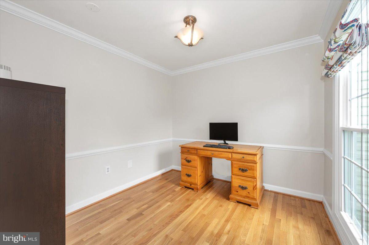 17900 Hickman Street Poolesville, MD 20837 - Photo 29 of 97 a room with a table and a window