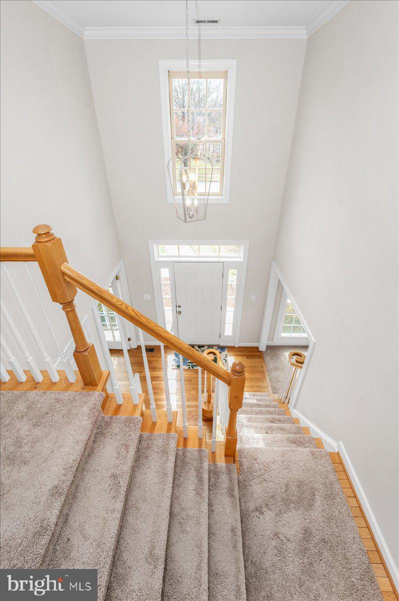 17900 Hickman Street Poolesville, MD 20837 - Photo 4 of 97 a view of entryway and hall with wooden floor
