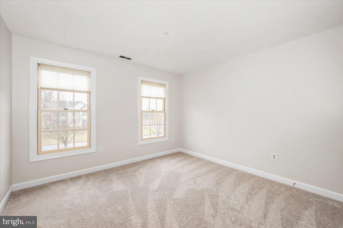 17900 Hickman Street Poolesville, MD 20837 - Photo 44 of 97 an empty room with a window