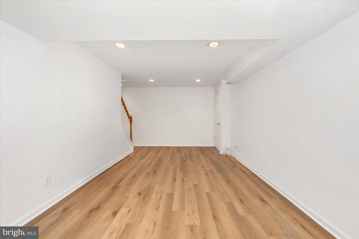 17900 Hickman Street Poolesville, MD 20837 - Photo 48 of 97 a view of empty room with wooden floor