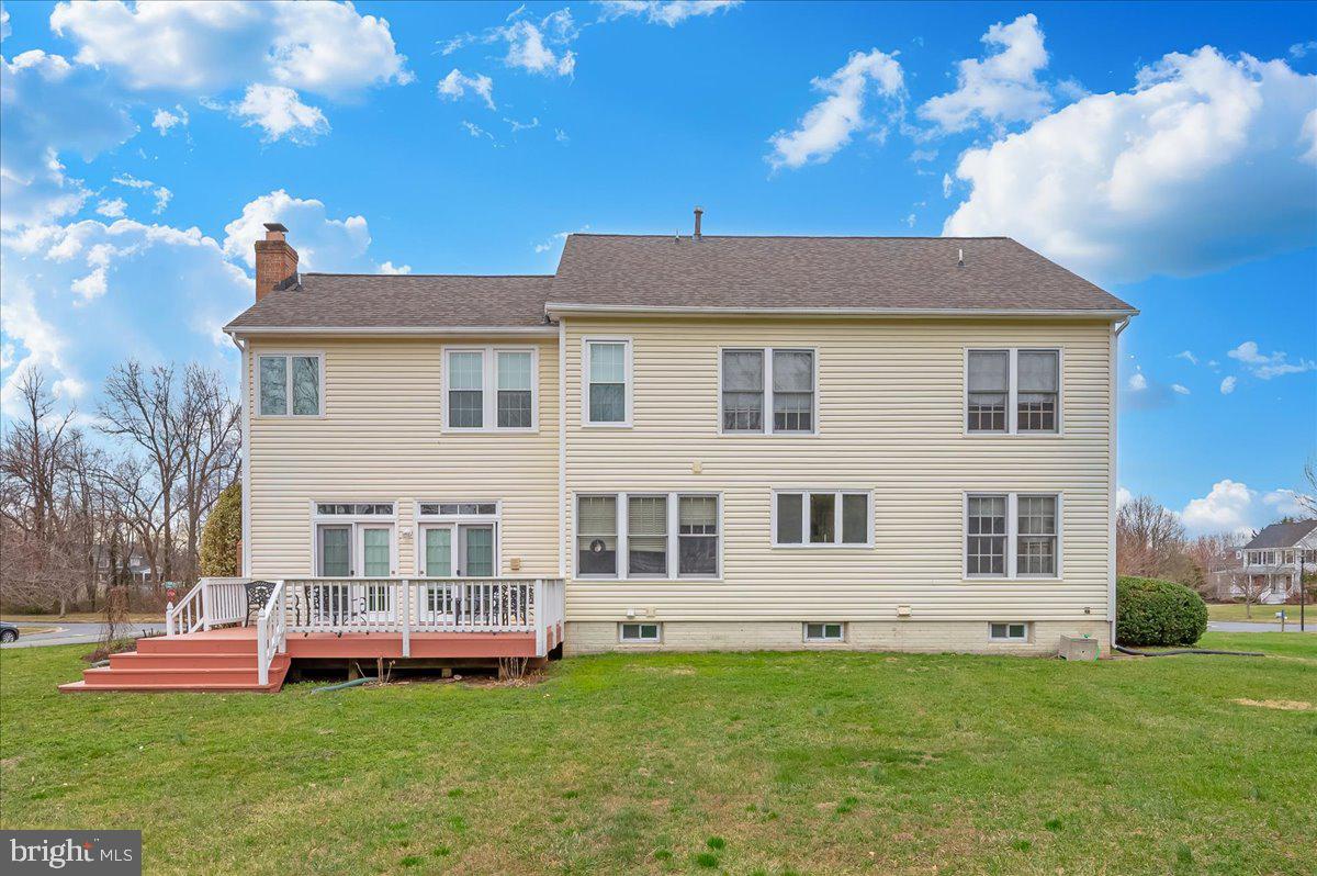 17900 Hickman Street Poolesville, MD 20837 - Photo 55 of 97 a front view of a house with a yard