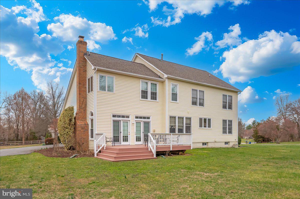17900 Hickman Street Poolesville, MD 20837 - Photo 56 of 97 a view of a house with a yard