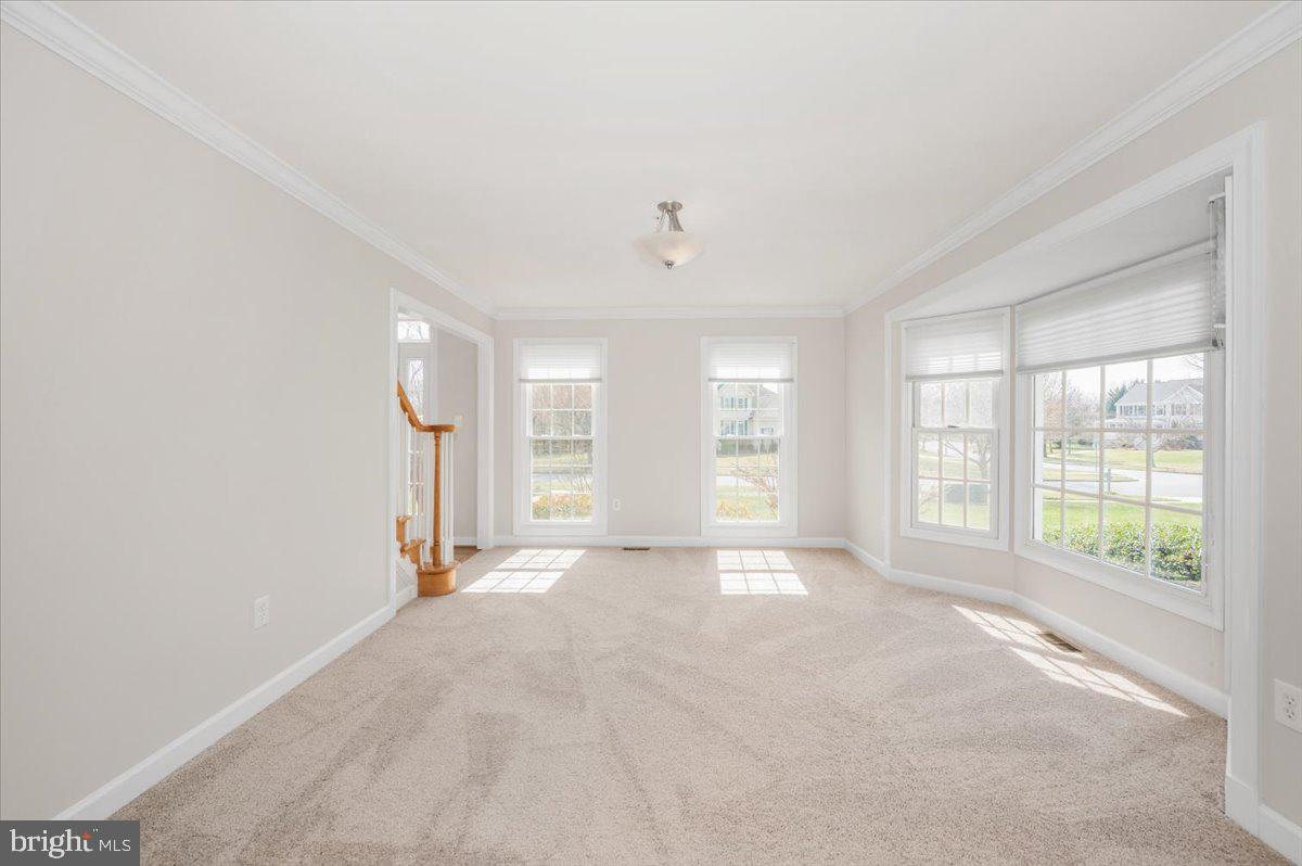 17900 Hickman Street Poolesville, MD 20837 - Photo 6 of 97 a view of an empty room with a window